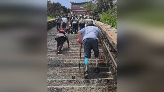 澳门管家婆100%精准香港和戴假肢3次登顶泰山与戴假肢3次登顶泰山会怎样